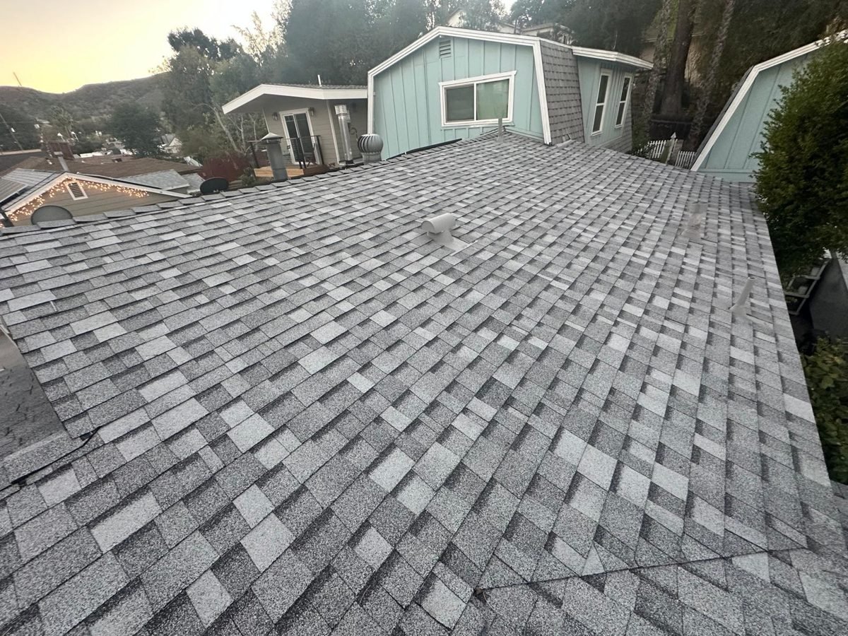Grey architectural shingles on a small Valley home